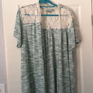 A blue with lace shrug. Rarely been worn.